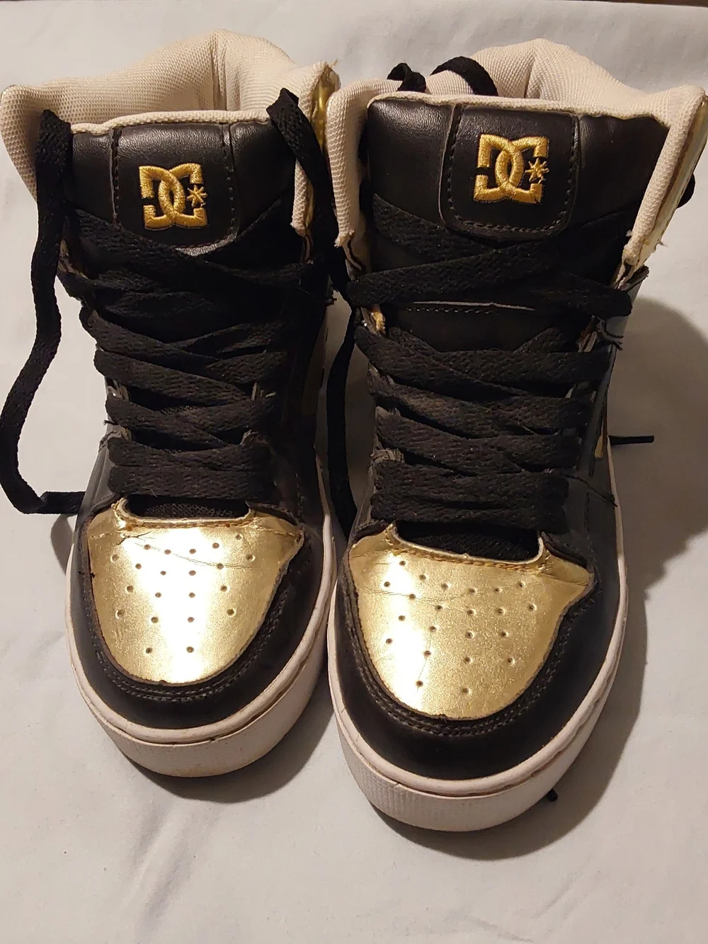 DC Kids Black and Gold High-Top Skate Sneakers